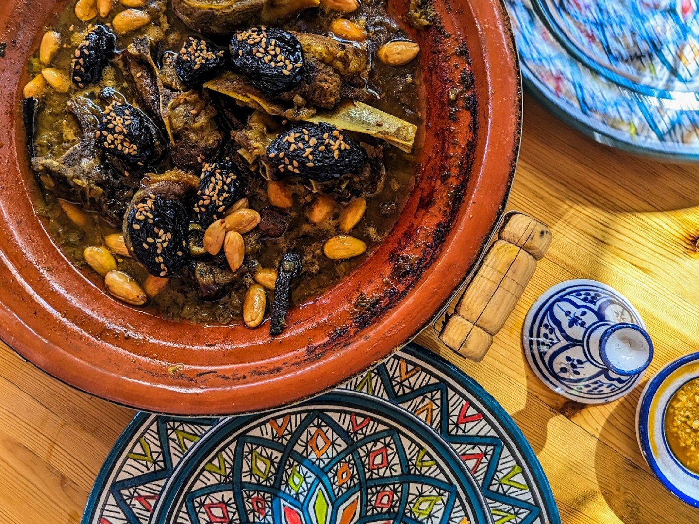 Savor Marrakesh's flavors in a heartwarming 3-hour cooking experience at Amal Center.
