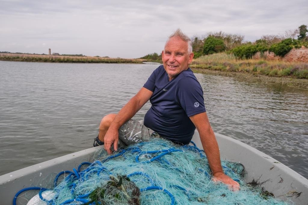 A captivating adventure through the Venetian Lagoon's rich flora and fauna on a leisurely boat tour.