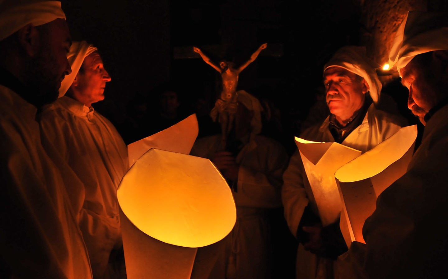 Sardinia private tours: Experience Lunissanti capturing its torchlit procession and sacred chants