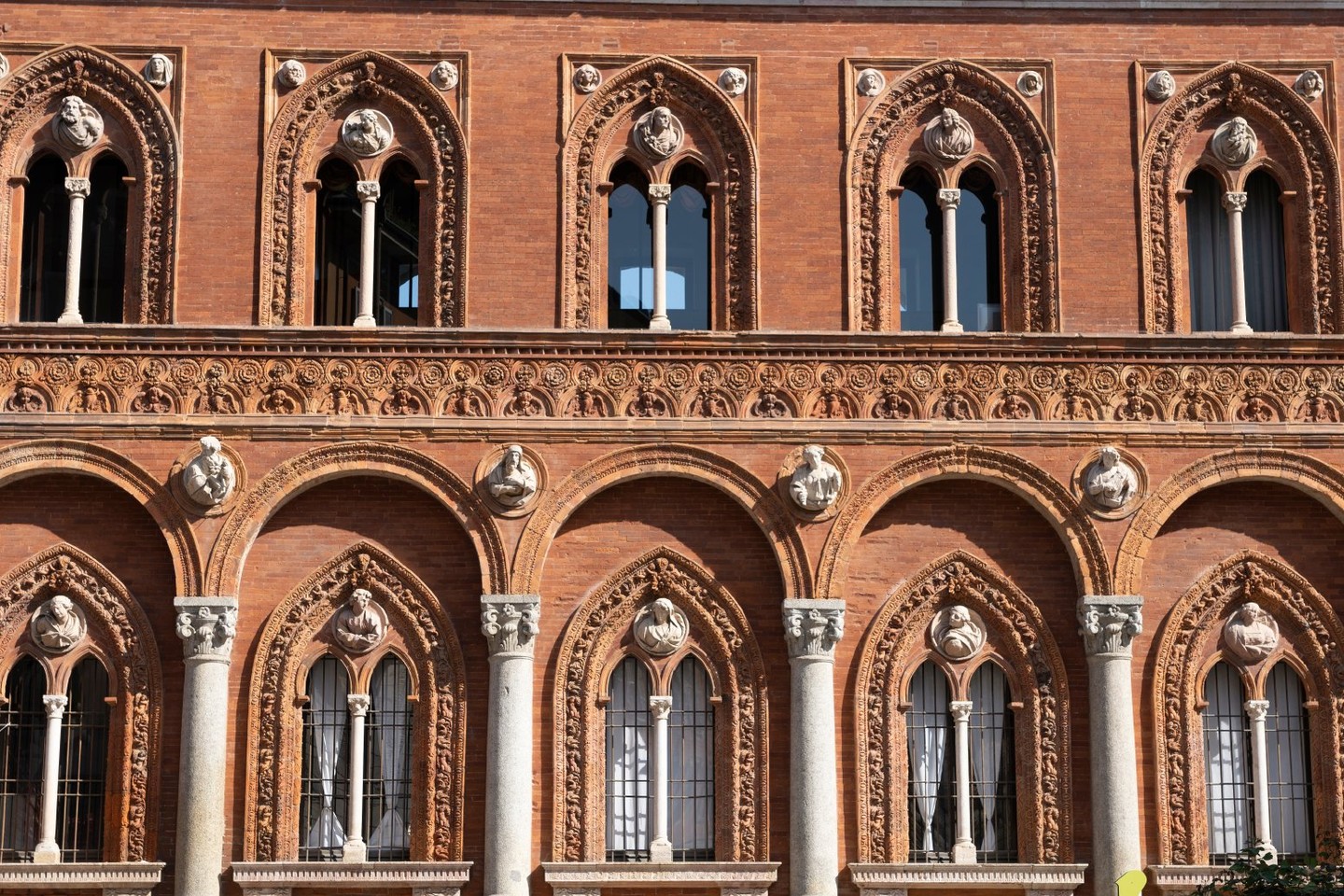 Explore Milan's enduring marvels: the historical Ca' Granda and the artistic Laboratorio Paravicini.