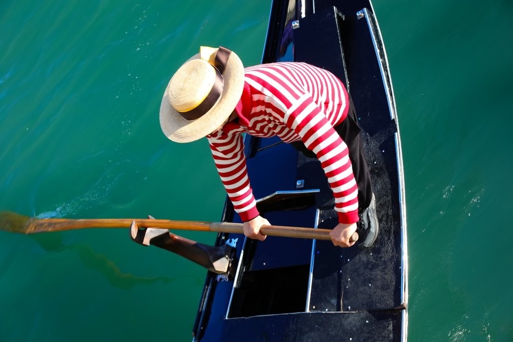 On a private Venice tour: Destination vow renewal with gondola ride, celebrant, and stunning photos