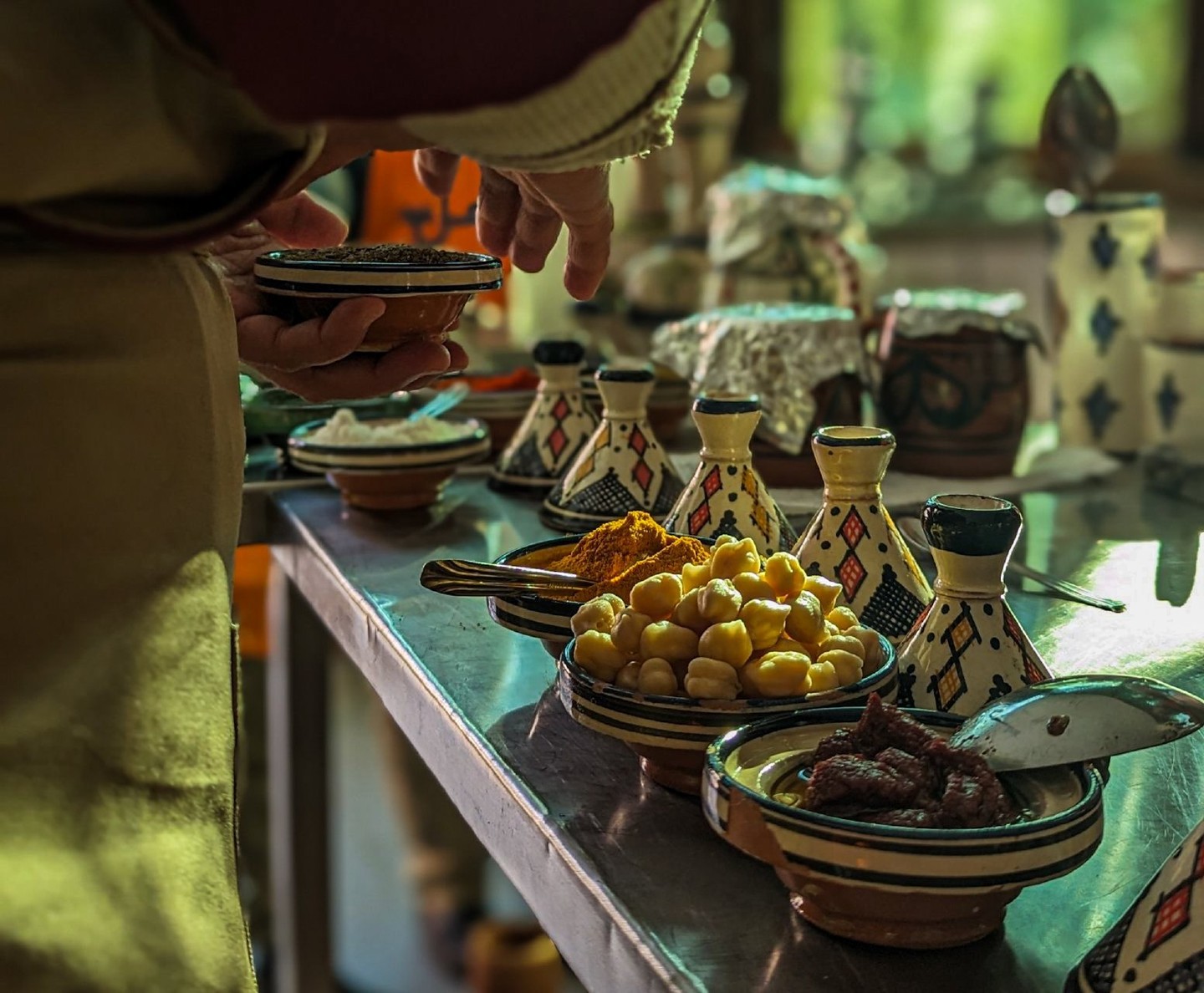 Savor Marrakesh's flavors in a heartwarming 3-hour cooking experience at Amal Center.